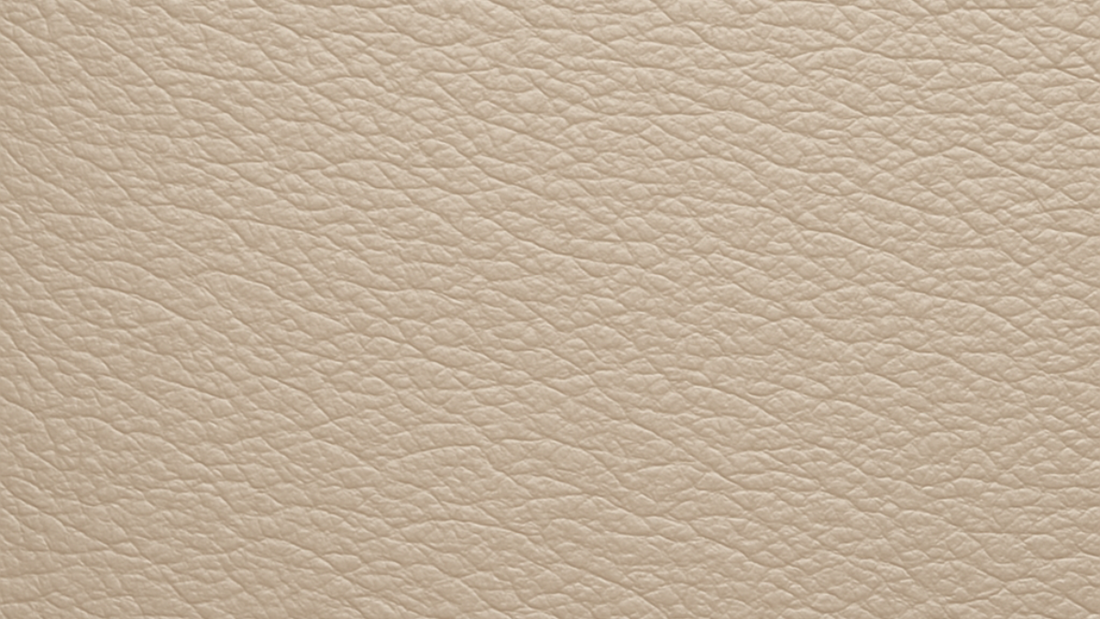 Close-up of stone vegan microfibre leather with a subtle grain texture, highlighting quality and finish.