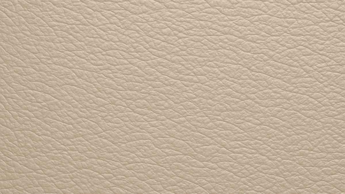 Close-up of stone vegan microfibre leather with a subtle grain texture, highlighting quality and finish.